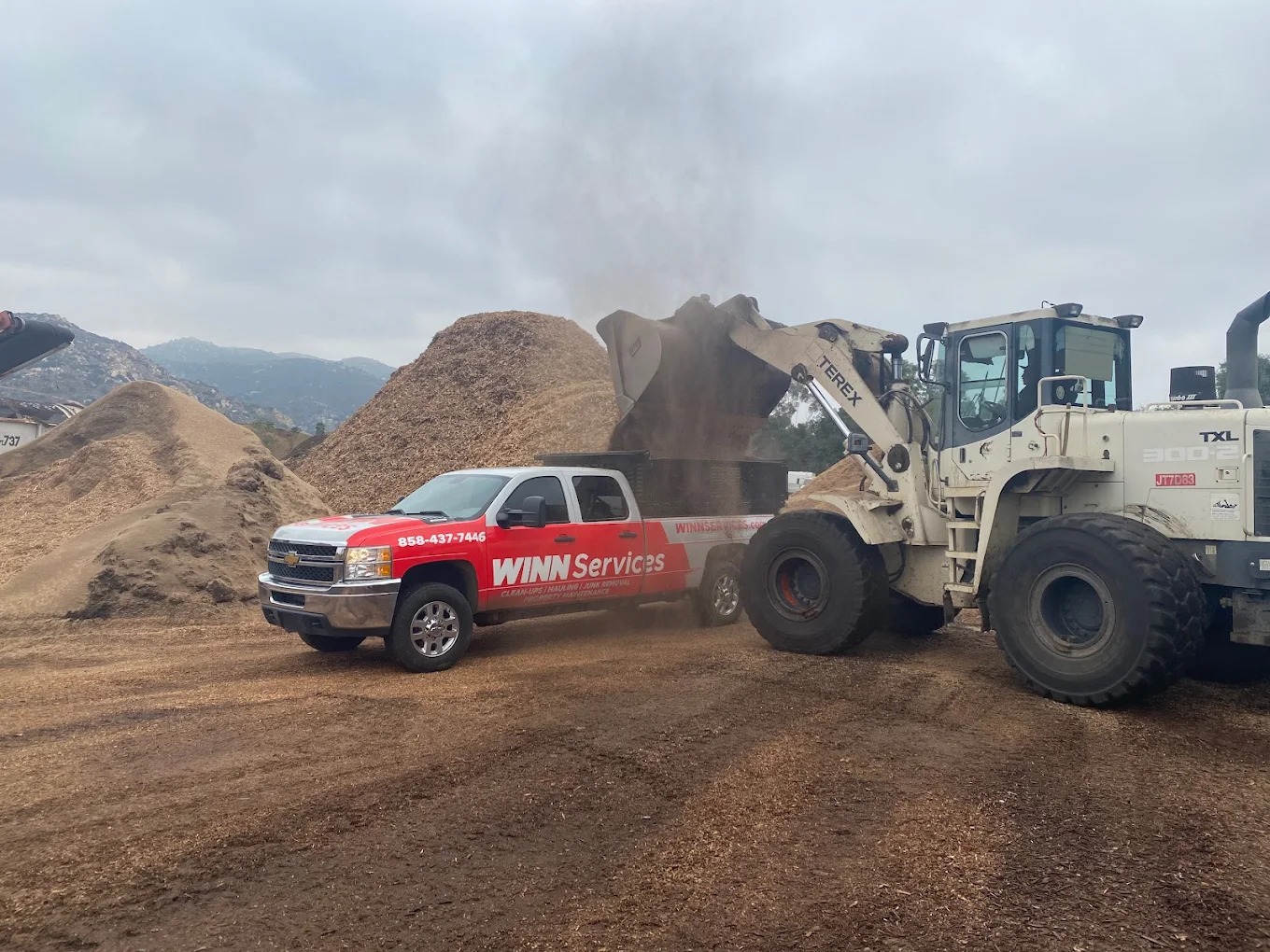WINN Services heavy loading debris with equipment